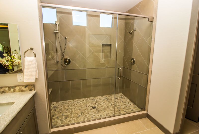 Modern walk-in shower with glass enclosure